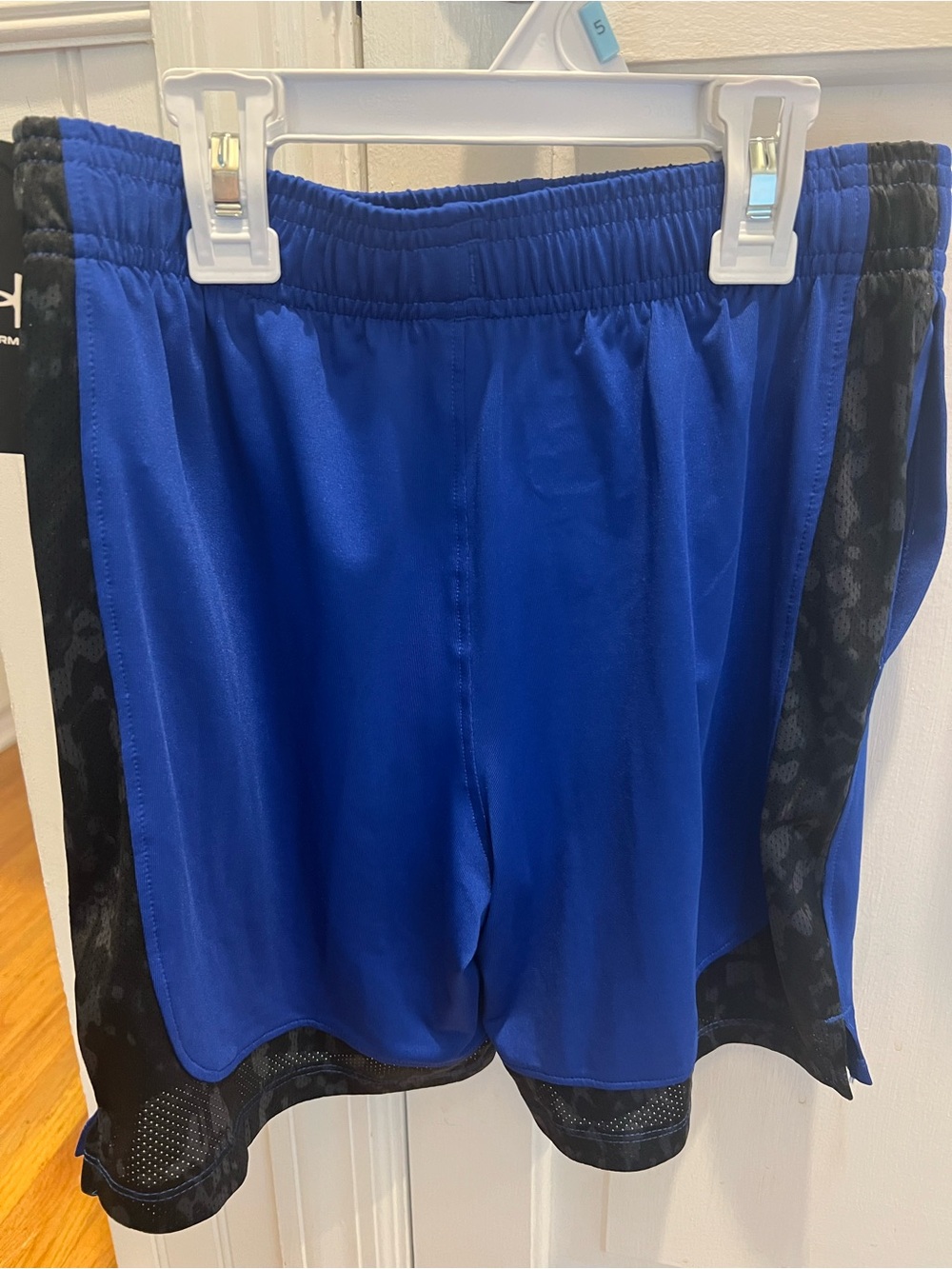 NWT- Under Armour boys Blue Athletic Shorts with Black Trim size youth medium